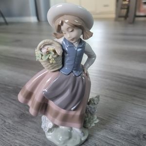 Lladro Ceramic Figurine with Pink and Blue Details
